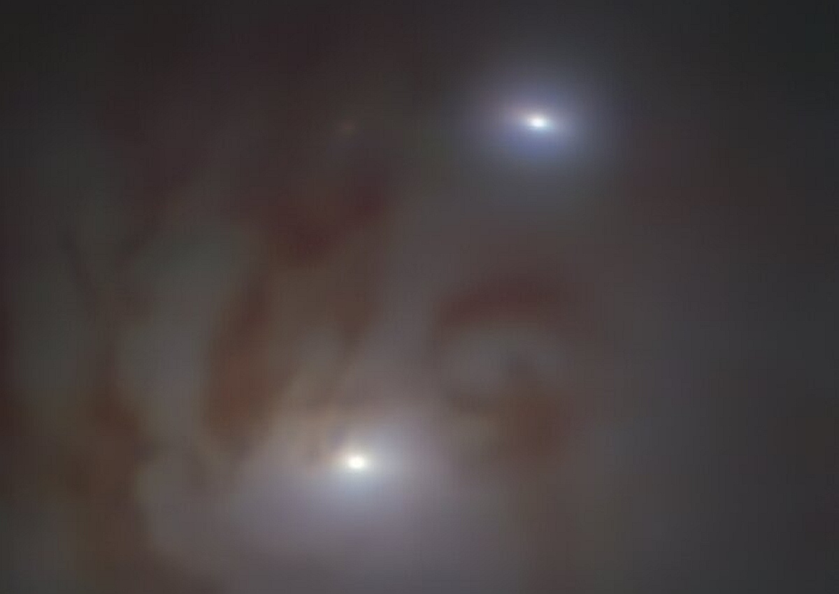 Astronomers Discover Supermassive Black Holes Pair Closest to Earth