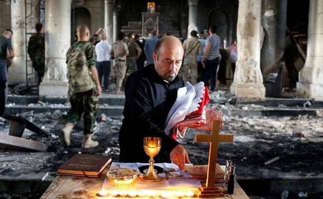 In Charred Church Near Mosul, Iraqi Christians Pray Once More