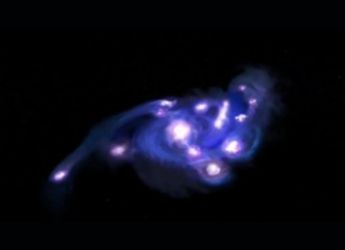 Astronomers Discover &quot;Cosmic Grapes&quot; Galaxy Packed with Star-Forming Clumps in the Early Universe