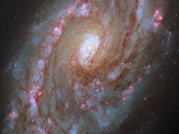 NASA Hubble Space Telescope Captures a Spiral Galaxy With Multiple Starburst Regions NASA Hubble Space Telescope Captures a Spiral Galaxy With Multiple Starburst Regions