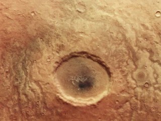 ESA&#039;s Mars Express Mission Captures Image of Crater on Red Planet, Shares Uncanny Resemblance to Human Eye