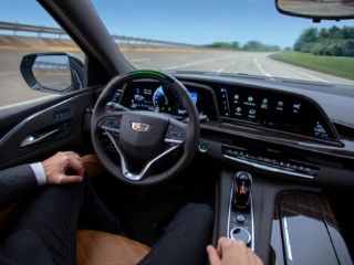 Automakers Race to Next Level of Not Quite Self-Driving Cars