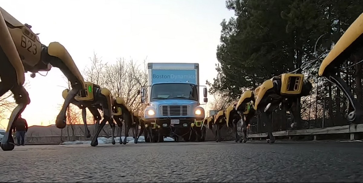 Boston Dynamics' Latest Video Shows Herd of Robotic Dogs Hauling Truck With Ease