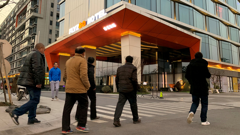 At Alibaba's Futuristic FlyZoo Hotel, Robots Deliver Towels and Mix Cocktails