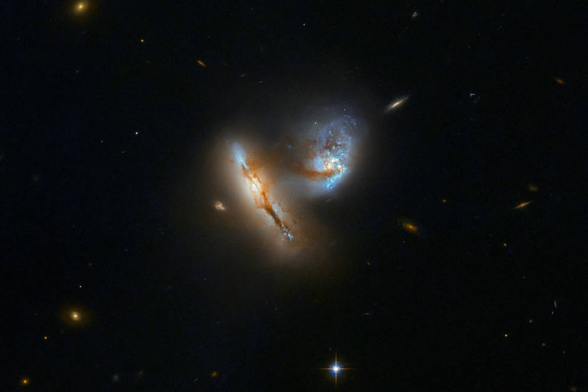 NASA's Hubble Space Telescope Captures Two Galaxies Interacting, Distorting