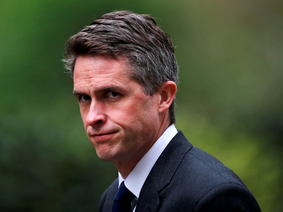 UK's May Fires Defence Secretary Over Huawei Leak