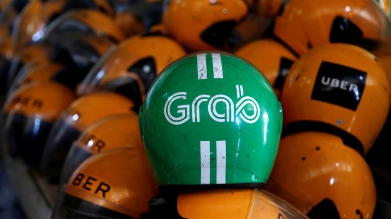 Philippine Watchdog Fines Grab, Uber for Rushed Merger, Drop in Service Quality