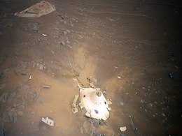 NASA's Ingenuity Helicopter Gives Aerial Perspective on the Perseverance Landing Gear on Mars Surface NASA's Ingenuity Helicopter Gives Aerial Perspective on the Perseverance Landing Gear on Mars Surface