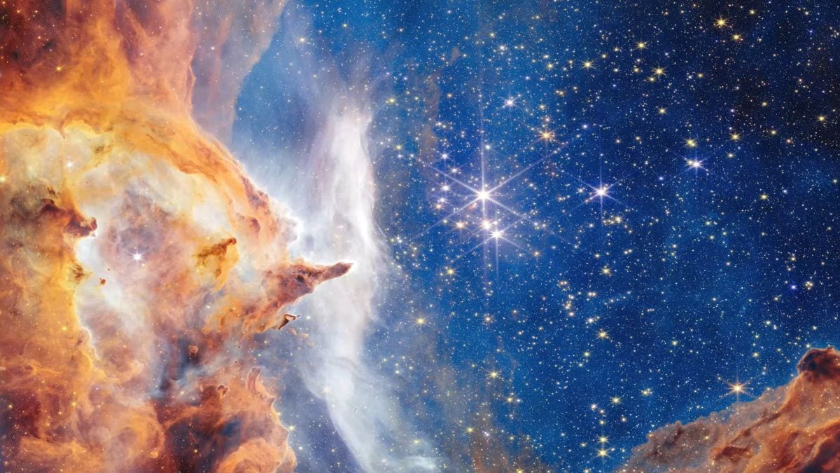 NASA's James Webb Space Telescope Captures Lobster Nebula’s Towering Spires and Massive Stars