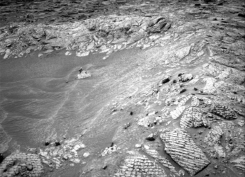 Le rover Curiosity de la NASA d&eacute;couvre un crat&egrave;re rempli de sable et modifie ses plans de forage