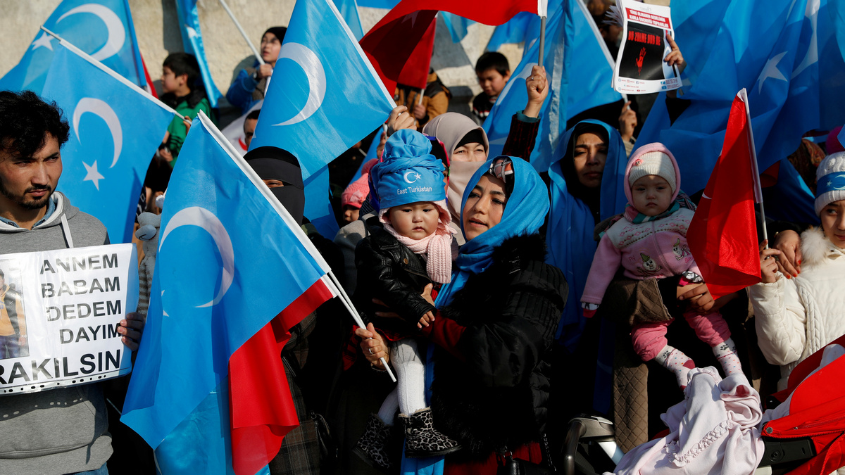 China's Uighurs Trapped in Factory Toiling for Tech Titans Like Apple, Lenovo