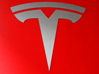 Tesla Says Crash Was Worsened by Missing Freeway Barrier Shield