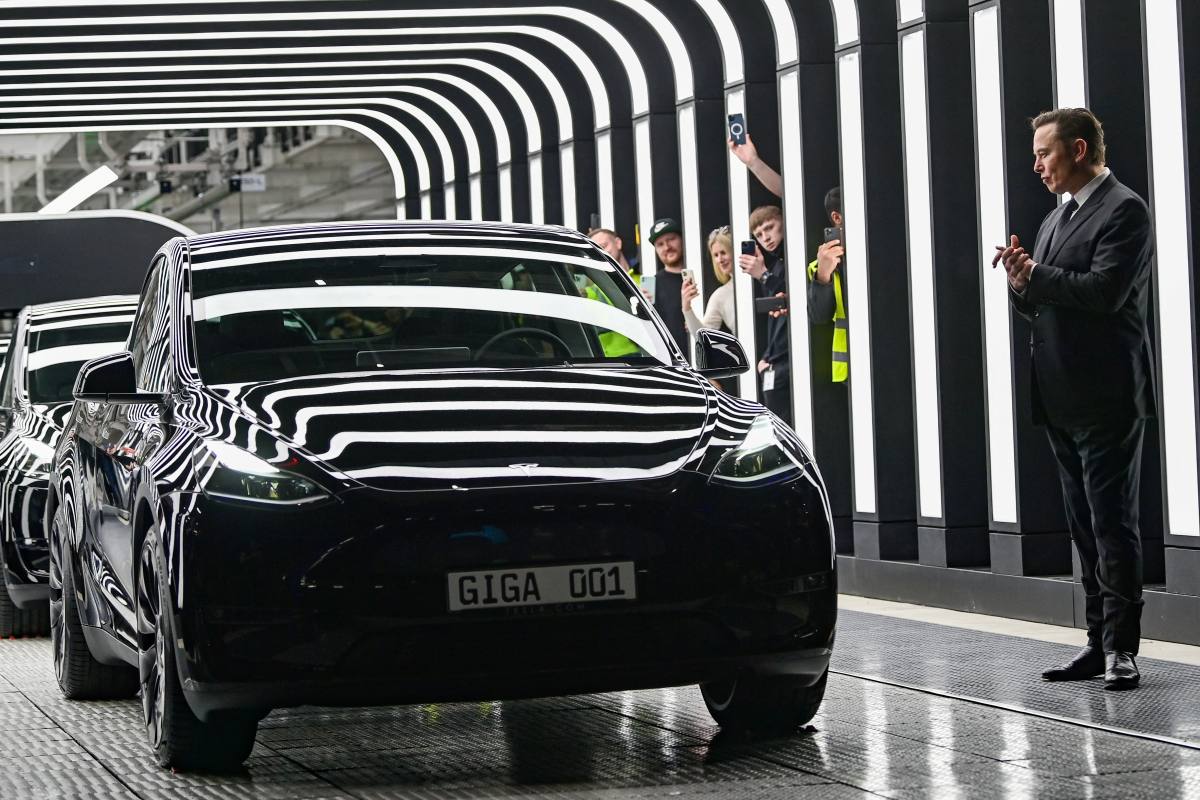 Dancing Elon Musk Hands Drivers First Teslas From New German Gigafactory