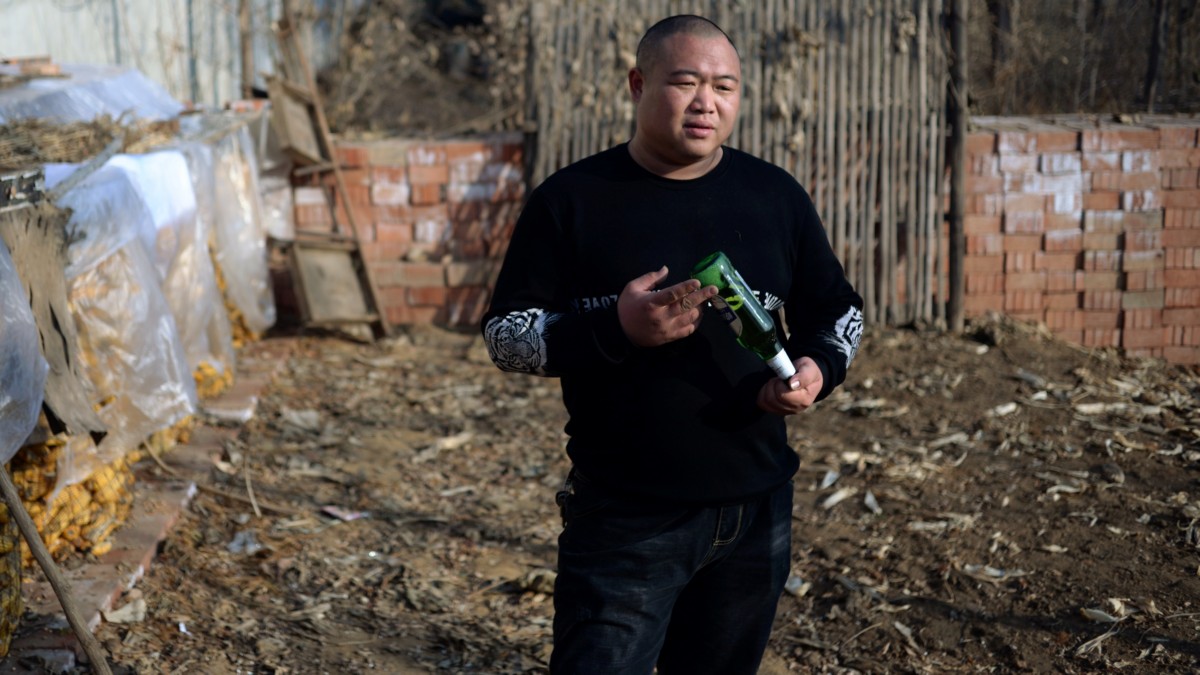 With 'Tornado Beer' and Brick-Breaking, Chinese Villager Becomes Twitter Sensation