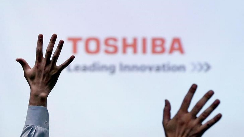 Toshiba Signs Deal to Sell Chip Unit to Bain-Led Group for $18 Billion