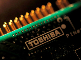 Toshiba Completes $21 Billion Sale of Chip Unit to Bain Consortium