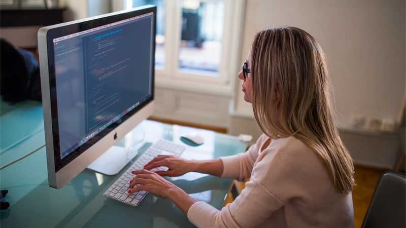 woman coder imac unsplash Coder